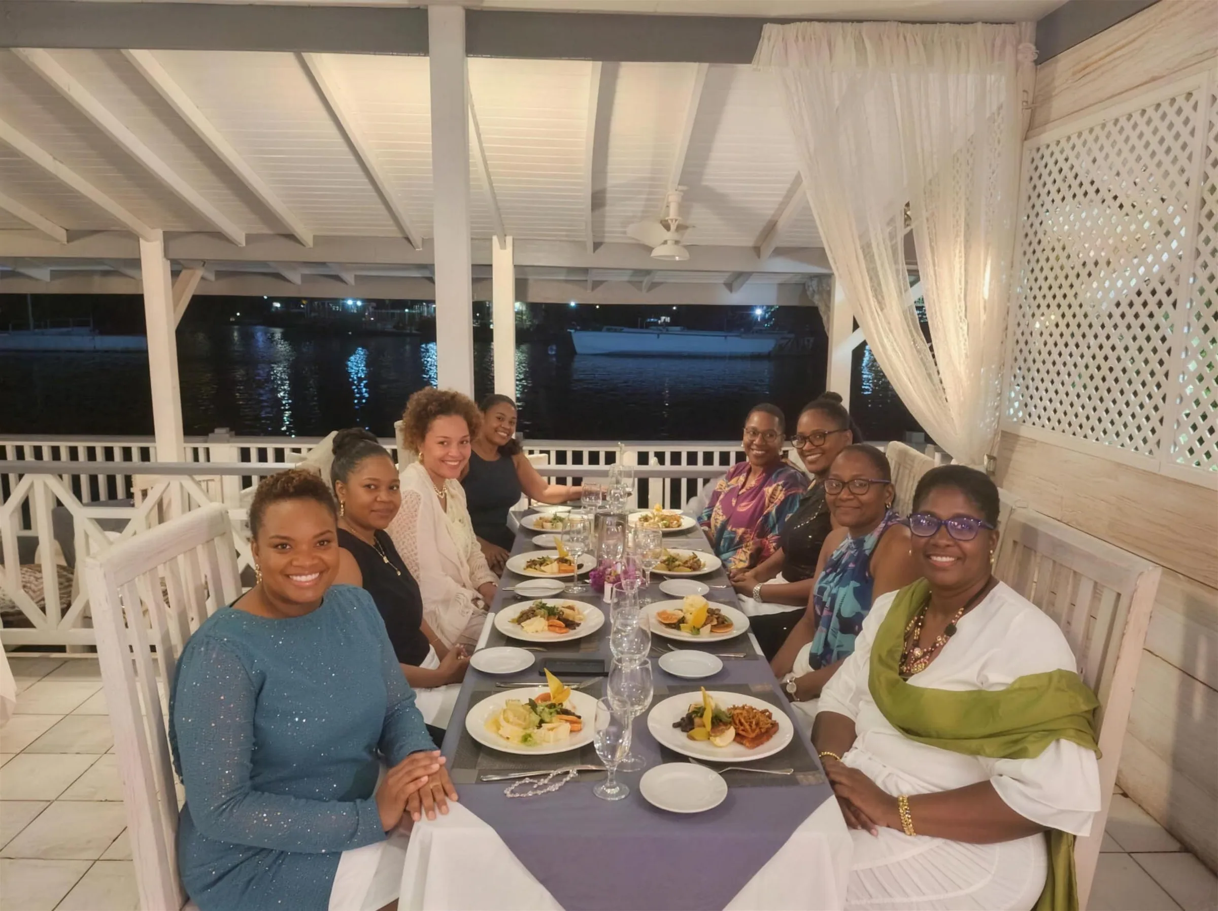 Members at a social dinner in Saint Lucia for International Women's Day 2025